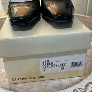Brand NEW. Classic.  Black with Patent leather. Veni. Size 7. Etienne Aigner.